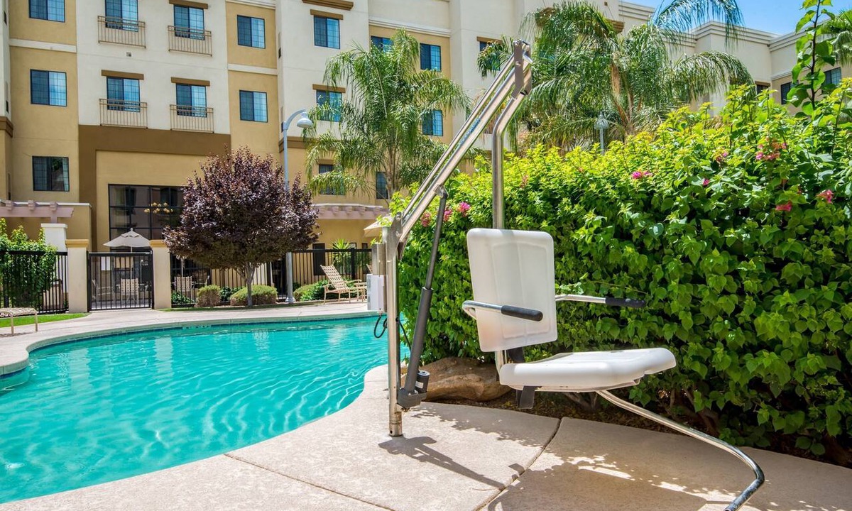 Glendale Sports and Entertainment District Apartment | Accessible 2BR Suite w/Pool + Daily Breakfast