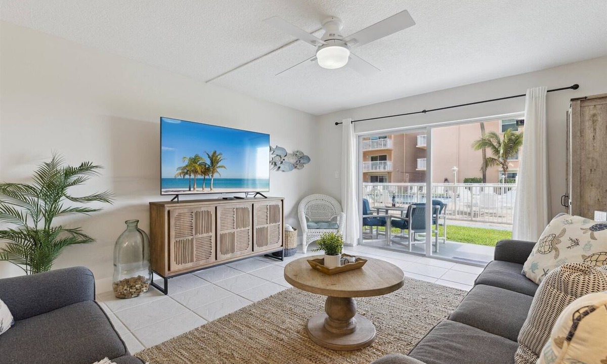 Cocoa Beach Condo | Beachside Ground-Floor Condo– Steps to the Beach W/Heated Pool & Private Patio