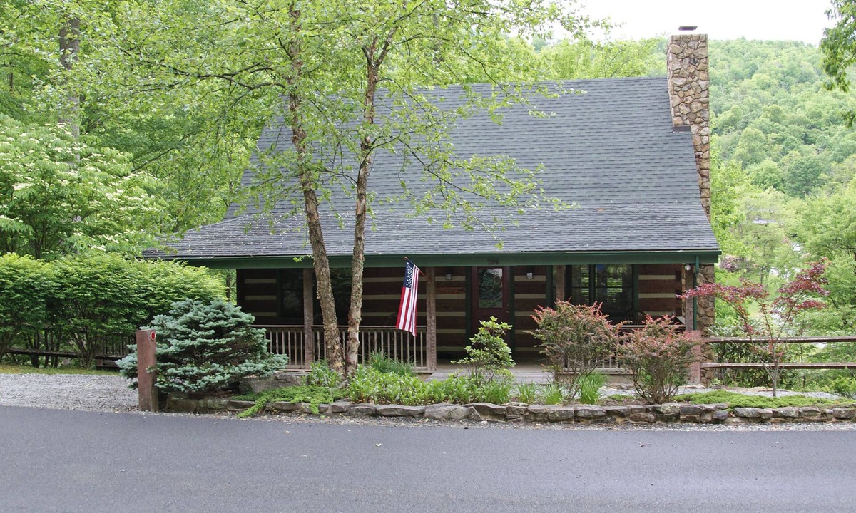 Seven Devils Cabin | Book your Fall Getaway! Firepit. Pond view. Wood burning fireplace.