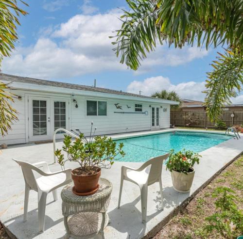 Interchange Square Apartment | Gorgeous four bedroom pool home in Palm Bay