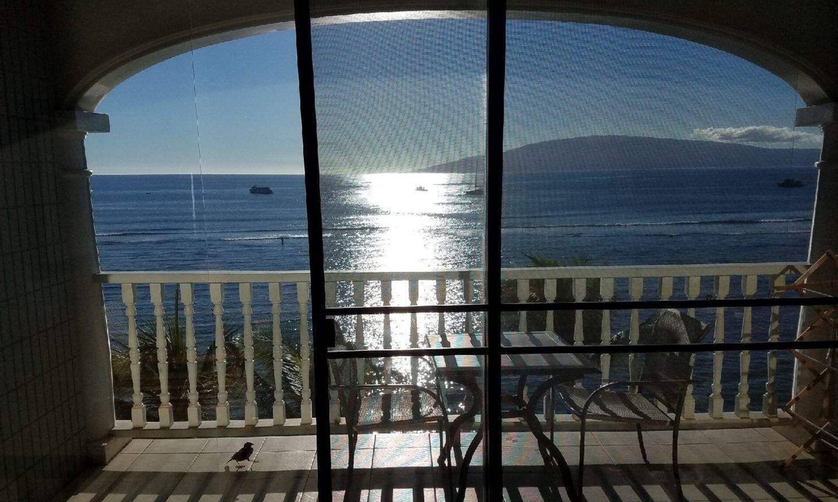 Historic Lahaina Front Street Apartment | Incredible ocean view above the palms! Lahaina Shores 603 is waiting for you.