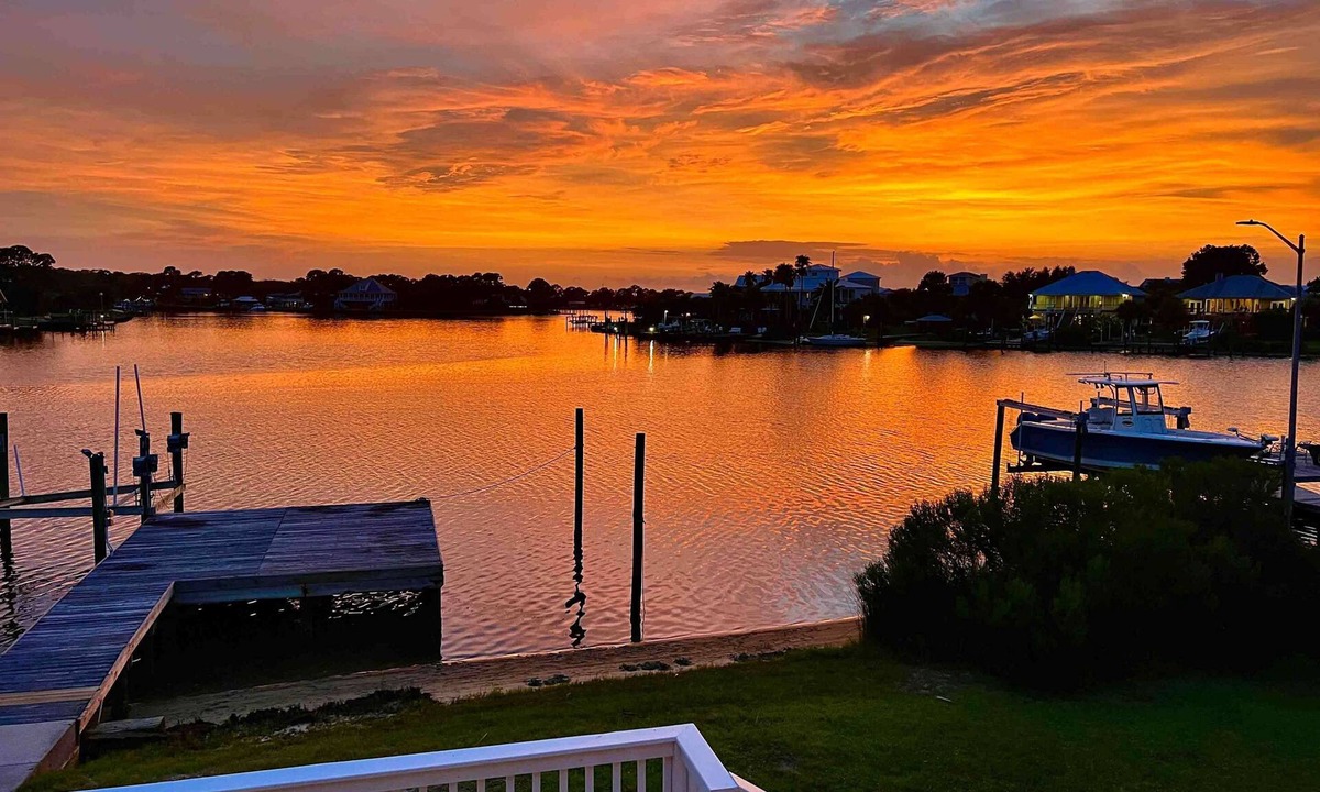 Sawgrass Pointe House | Inviting waterfront home with balcony, full kitchen, central AC, & W/D