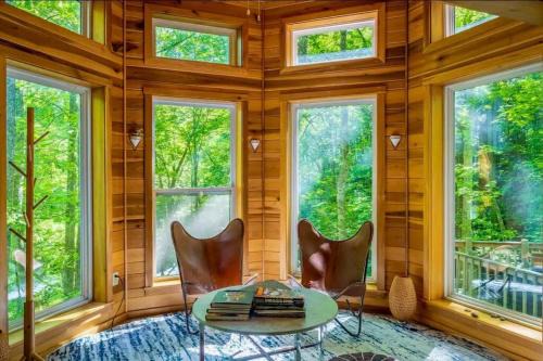 Hot Springs House | Luxury Mountain Cabin with Private Waterfall, Game Room, Scenic Views and Hiking Trails