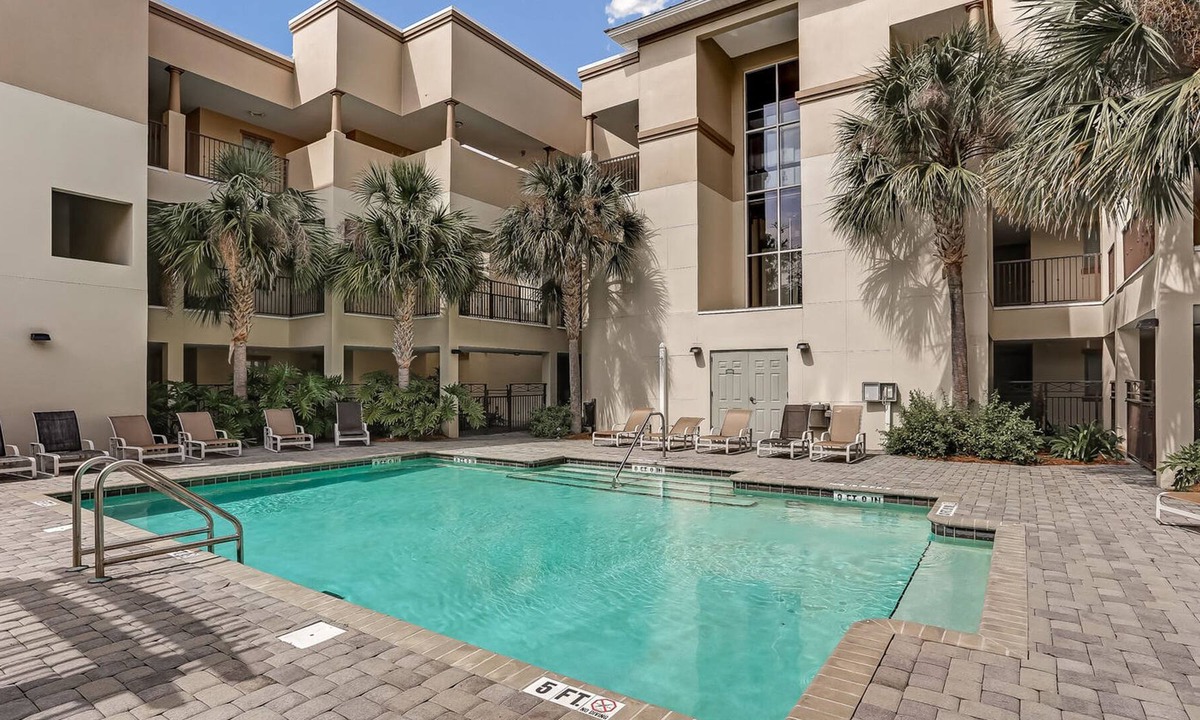 Fernandina Beach Condo | Private Tennis Villas Condo Featuring Free WiFi, Shared Pool, Private W/D, AC