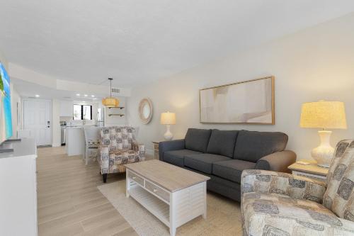 Mid Island Apartment | Seaside 209- Oceanview 2BR 2BA Condo with Pool, Steps to Beach condo