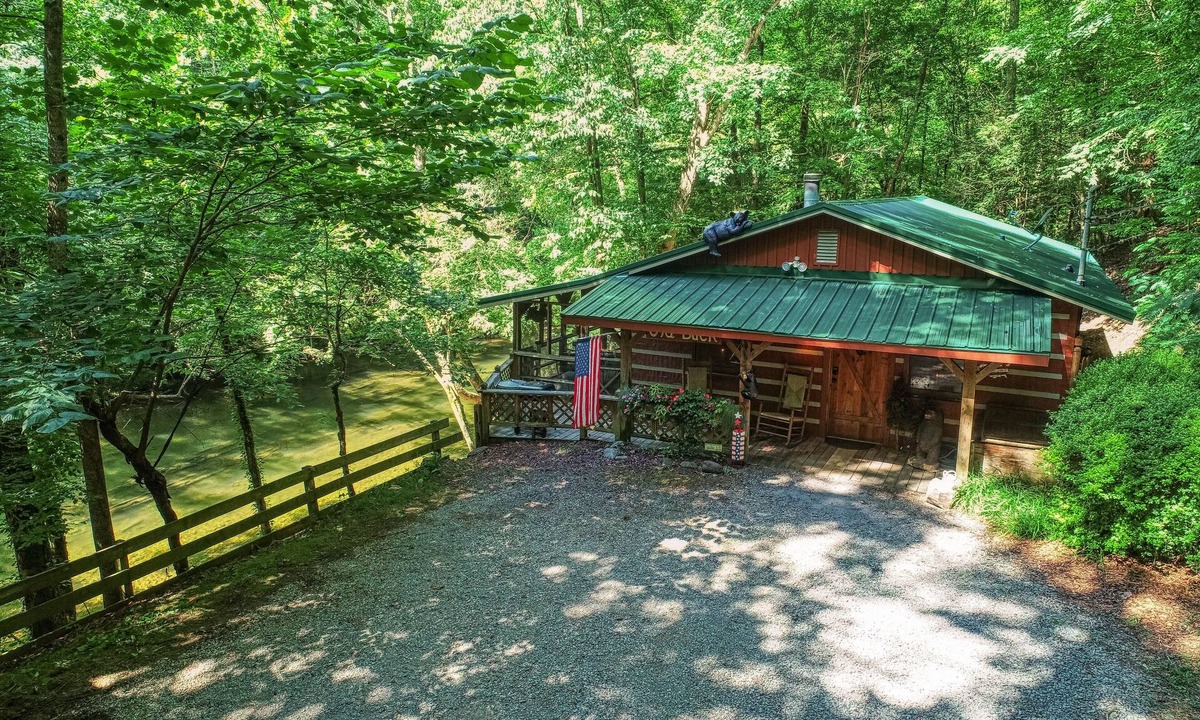 Sevierville Cabin | Secluded Riverfront Cabin Sounds of the River Screened Porch Gazebo Hot Tub