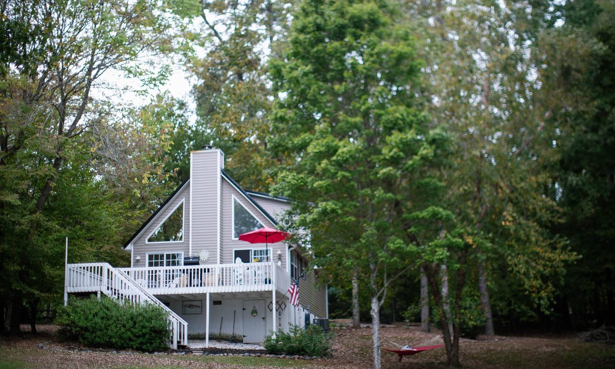 Eatonton House | Serene Lakefront Home with Private Dock, Hot Tub, Fire Pit and Boat!