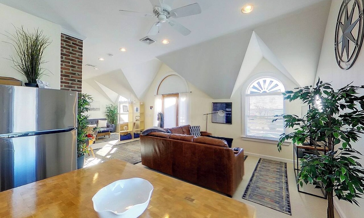 Yachting Village Apartment | Unwind in harbor luxury at this sophisticated studio in Newport's Yachting Village! Cozy queen bed + pull-out sofa bed, fully stocked kitchen, huge deck with sunset harbor views, mini-split AC, TV, off-street parking. Steps to marinas, Thames Street
