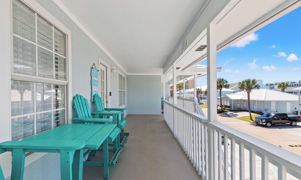 West Panama City Beach Condo | Walk to Beach 2BR Sleeps 7 Pool + Beach Gear