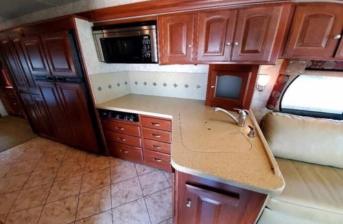 Columbiana House | 2011 Winnebago Adventurer 35P - Unit Rental / NO site