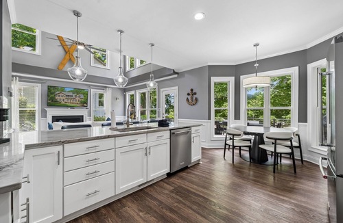 Mayhew House | 3 Story Waterfront Brick Home w Brand New Pool/Spa, foosball, ping pong and much more