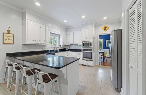 Augusta House | 4,000 sf home offers 6 bedrooms, 3 full baths, and 3 separate living rooms,