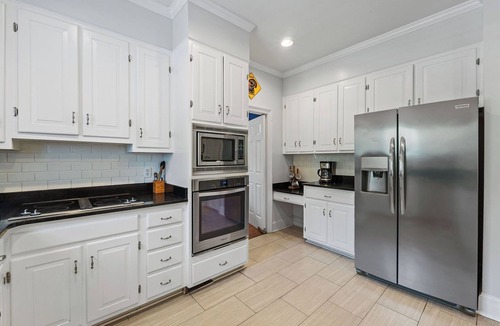 Augusta House | 4,000 sf home offers 6 bedrooms, 3 full baths, and 3 separate living rooms,
