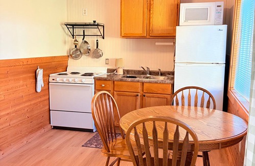 Poynette House | #4 Riverfront Lodging. Beach, Boat, Fish, Hike.