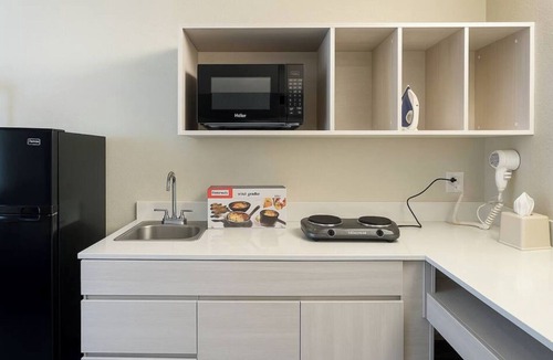 Griffin Apartment | Affordable hotel suites with WiFi, AC in charming McDonough