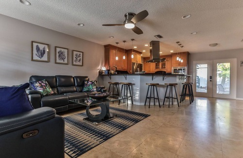 New Smyrna Beach House | Beach House with heated pool. Short walk to beach. 4 BRs/3.5 baths. Luxury.