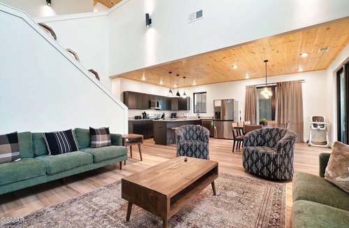 Sevierville Cabin | Cabin with Indoor Pool, Golf Sim, Theater, Hot Tub, Massage Chair and EV Charger