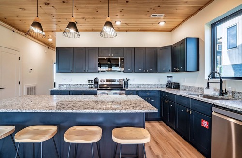 Sevierville Cabin | Cabin with Indoor Pool, Golf Sim, Theater, Hot Tub, Massage Chair and EV Charger