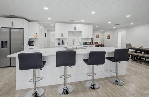 Port Richey House | Canal Front Retreat | Private Pool, Dock, and Game Room