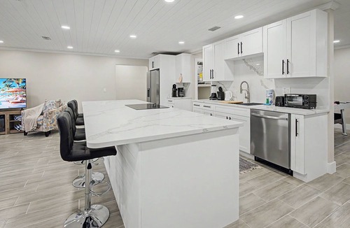 Port Richey House | Canal Front Retreat | Private Pool, Dock, and Game Room