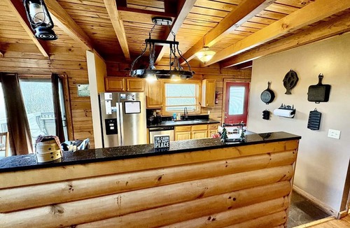 Clyde House | Charming Cabin Rental with a Hot Tub and Fireplace in the Smoky Mountains