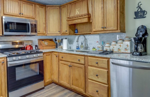 Covington House | Charming Covington Retreat w/ Yard & Sunroom!