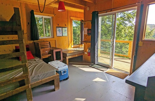 Saint-Faustin-Lac-Carre House | Cliffside treehouse, upper floor bedroom, lake view | Lodging #17