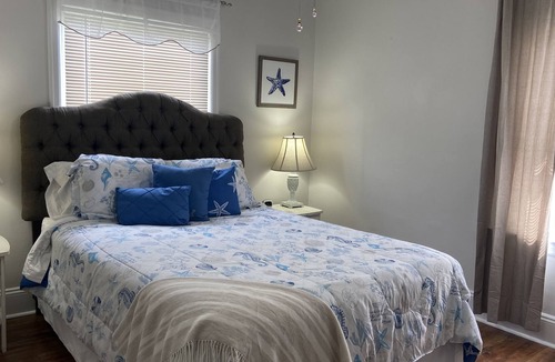 Gulfport House | Come stay at the Sand Dollar Cottage and hop down to the beach!!