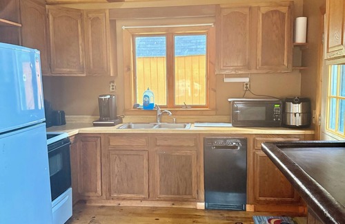 Oquossoc House | Convenient Lakeside House