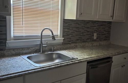 East Point House | Cozy 2-bedroom house just 12 min from the airport and a 2 min drive to Walmart