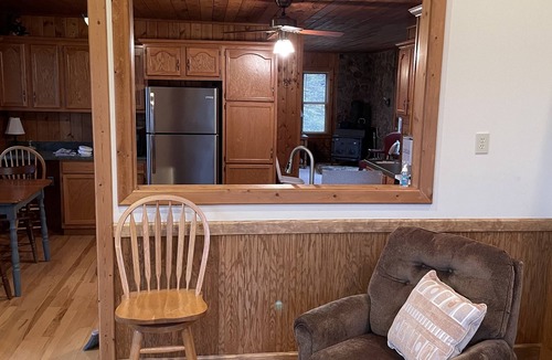 Tuckasegee House | Cozy, 4 front porch rocking chairs, porch swing, picnic shelter, outdoor fire.