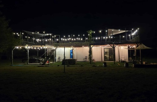 Wagoner House | Cozy-Chic Container Tiny Home + Treehouse Deck