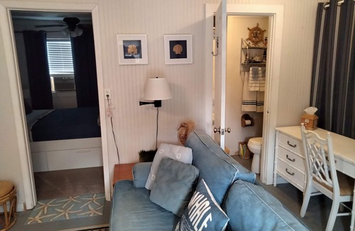 Waveland House | Cozy Downstairs Unit located down the street from the beaches, and Swimming Pool