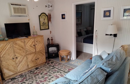 Waveland House | Cozy Downstairs Unit located down the street from the beaches, and Swimming Pool