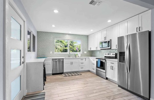 Palm Harbor House | Crystal Beach Paradise | Heated Pool, Spa, Firepit