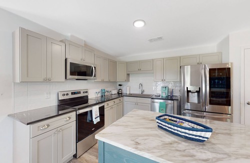 Oak Court House | Dog-friendly home near beach / park with game room, AC, & W/D
