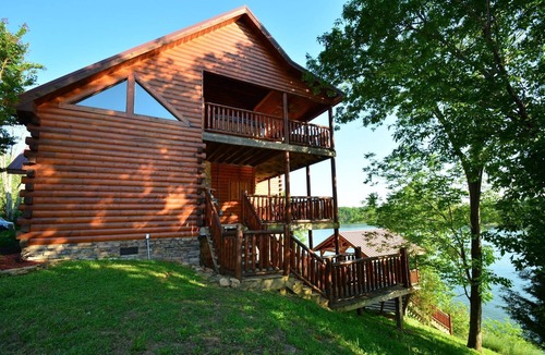 Sevierville Cabin | Douglas Lake Retreat w/80' Ramp to Fishing Dock, Grill, Hot Tub, Foosball, WIFI & Free Tickets!