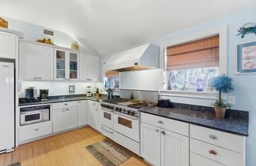 Ocean Springs House | Enchanting Spacious Beach House With Hot Tub, Game Room, Tiki Bar & Fishing Dock