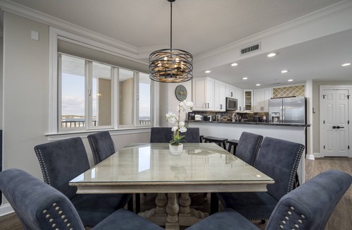 Ocean City Condo | Enjoy a large, spacious designer unit with all the extras plus an indoor pool, outdoor pool, fitness room, assigned parking and shops on the ground level.