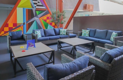 Little Italy Hotel | Enjoy Scenic Harbor Views from Bright Room in Little Italy’s Artistic Hub