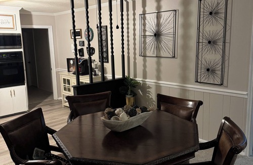 Jones County House | Escape to Retro Luxe, where vintage charm meets modern luxury.