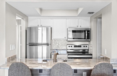 South Island Apartment | Estero Yacht & Racquet 215