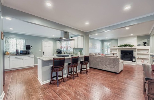 Candler-McAfee House | Experience Modern Comfort at The Pink Magnolia House