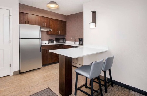 Town Center Apartment | Family Hotel with Fully Equipped Kitchen & Outdoor Pool in Downtown Kennesaw!