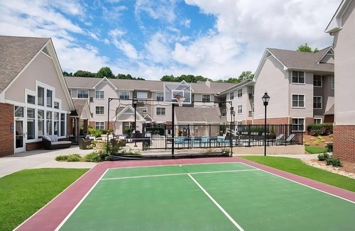 Town Center Apartment | Family Hotel with Fully Equipped Kitchen & Outdoor Pool in Downtown Kennesaw!