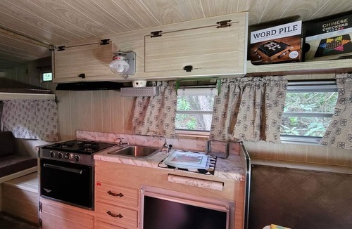 Hartford House | Foraging Orange vintage 60's camper near Rafting