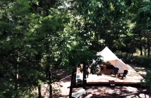 Newport Cabin | GlampVentures "Royal Rest" Bell Tent @ river/lake near the Smoky Mtn.