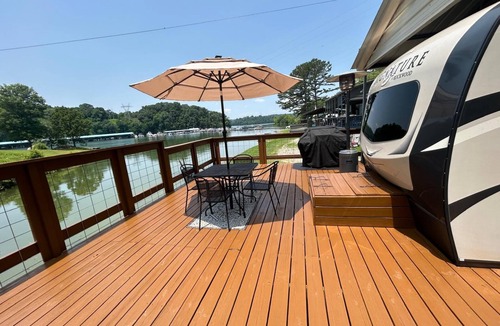 Dandridge RV Rental | Gorgeous Modern Camper located on Lake Douglas with Hot Tub!