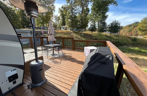 Dandridge RV Rental | Gorgeous Modern Camper located on Lake Douglas with Hot Tub!