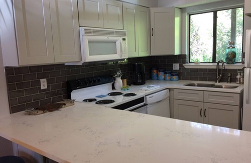 West Panama City Beach Resort | Ground floor condo with great pools and across from white sand beaches!